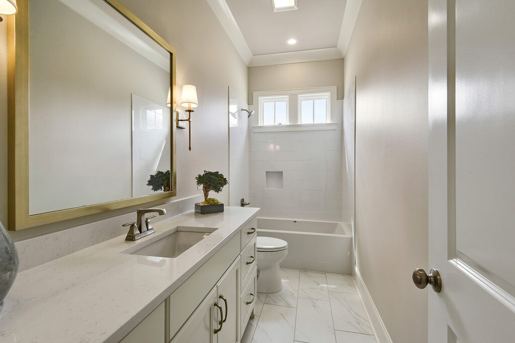 Fountainbleau Half Bathroom Design - Highland Homes Living - Louisiana Home Builder