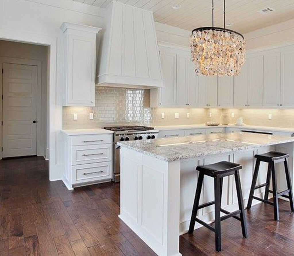 White kitchen by Highland Homes Chatsworth