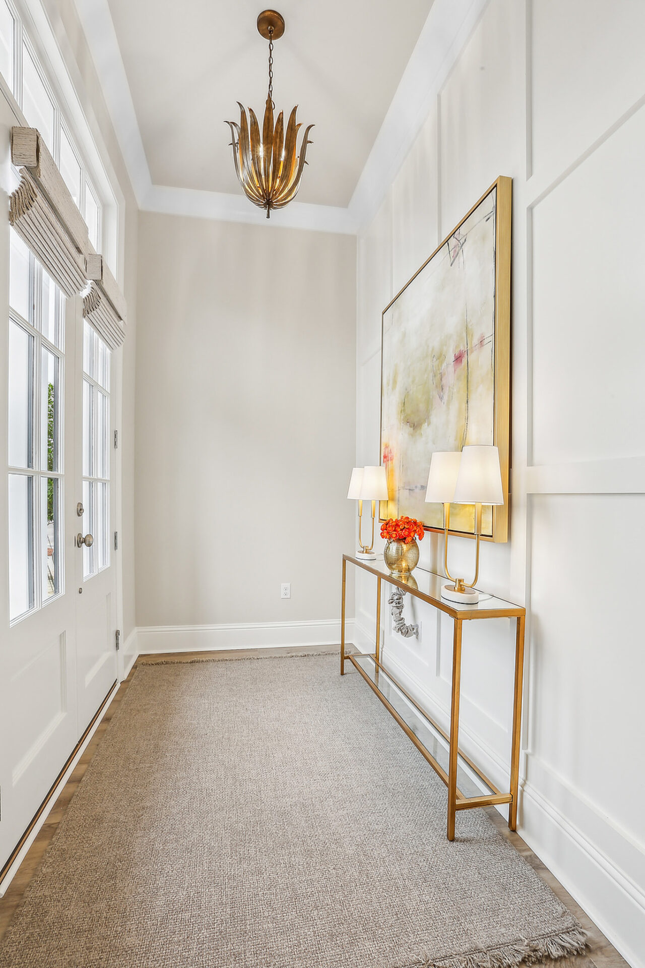 Home Entry with feature wall by Highland Homes, Dalmore